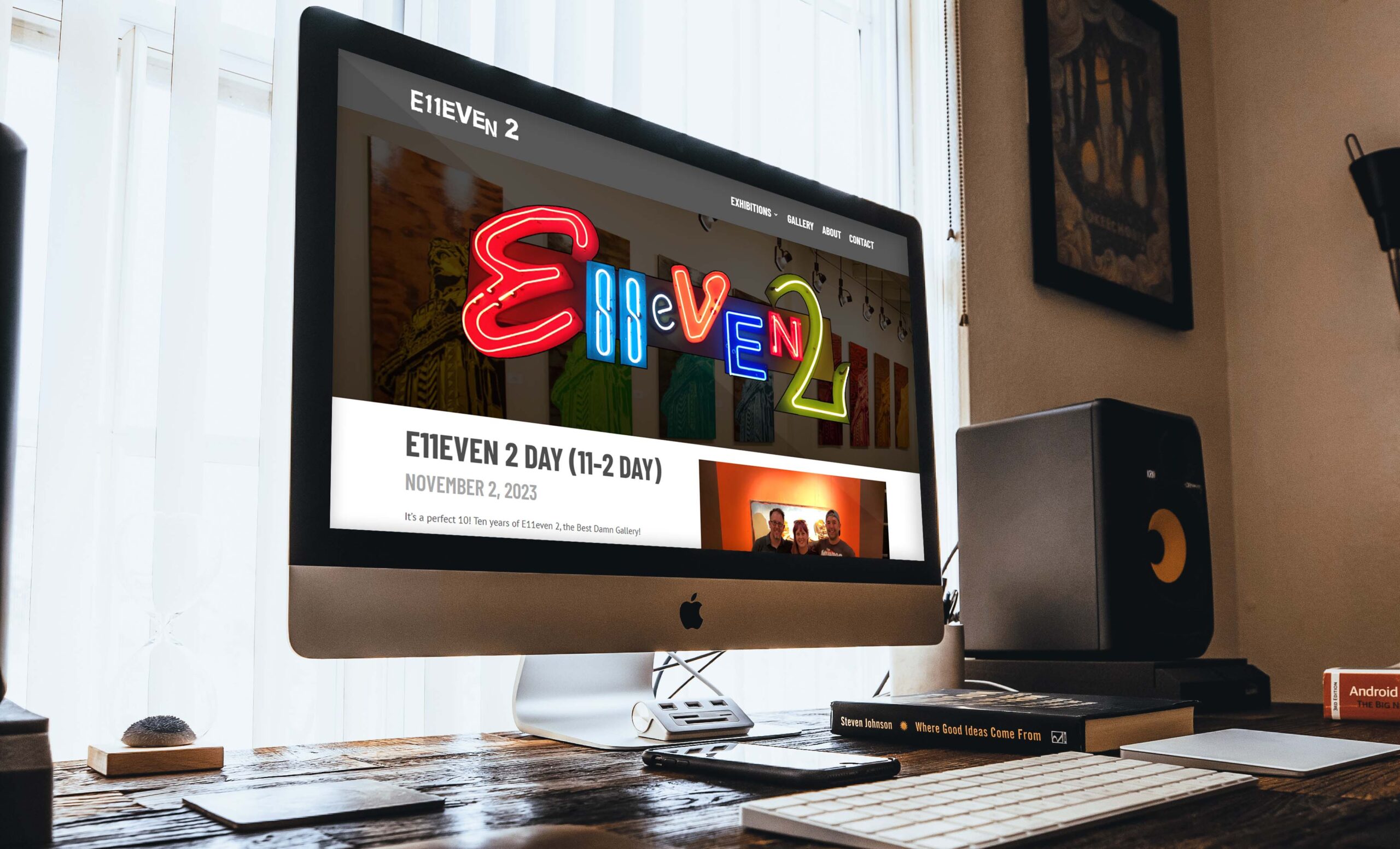 E11EVEN 2 home paged mocked up on a desktop screen.